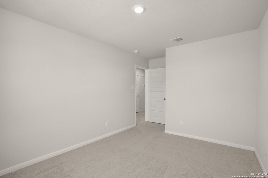 Spacious, unfurnished interior of a new home in Abbott Place, St. Hedwig (Image 20).