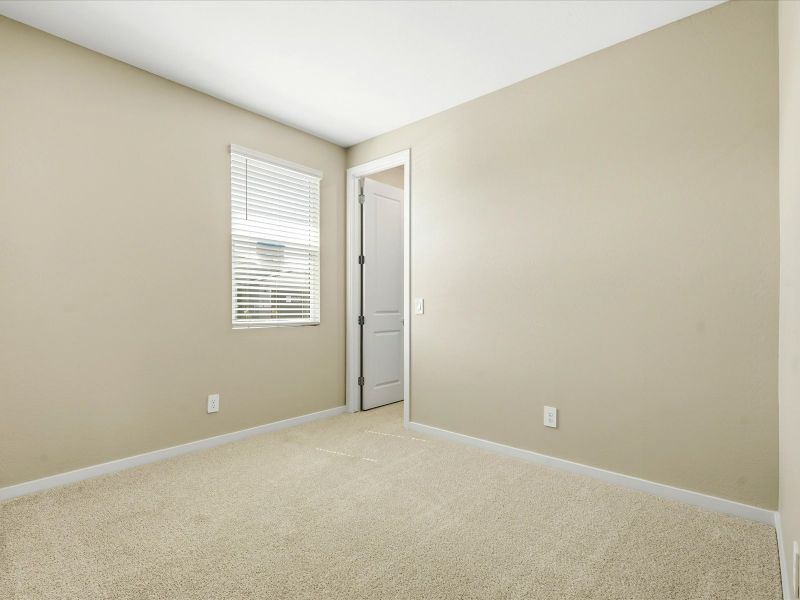 Spacious, unfurnished interior of a new home in White Tank Foothills Signature Series, Waddell (Image 18). Spacious, unfurnished interior of a new home in White Tank Foothills Signature Series, Waddell (Image 18).