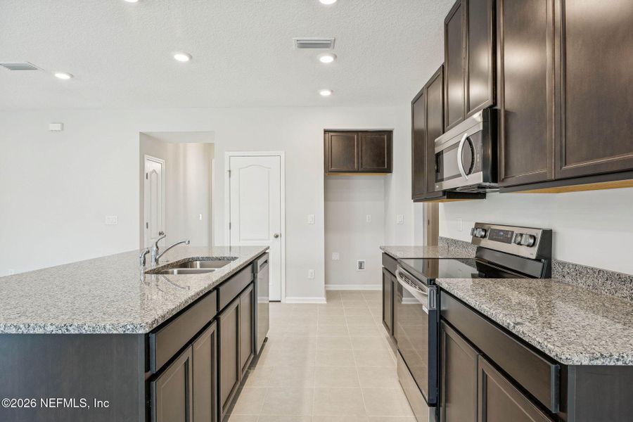 Furnished interior view inside a new home in Weston Woods, Jacksonville (Image 8).