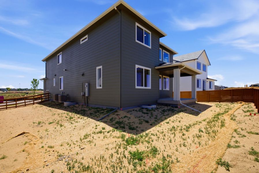Exterior details and patio area of a home in Cordovan, Firestone (Image 19).