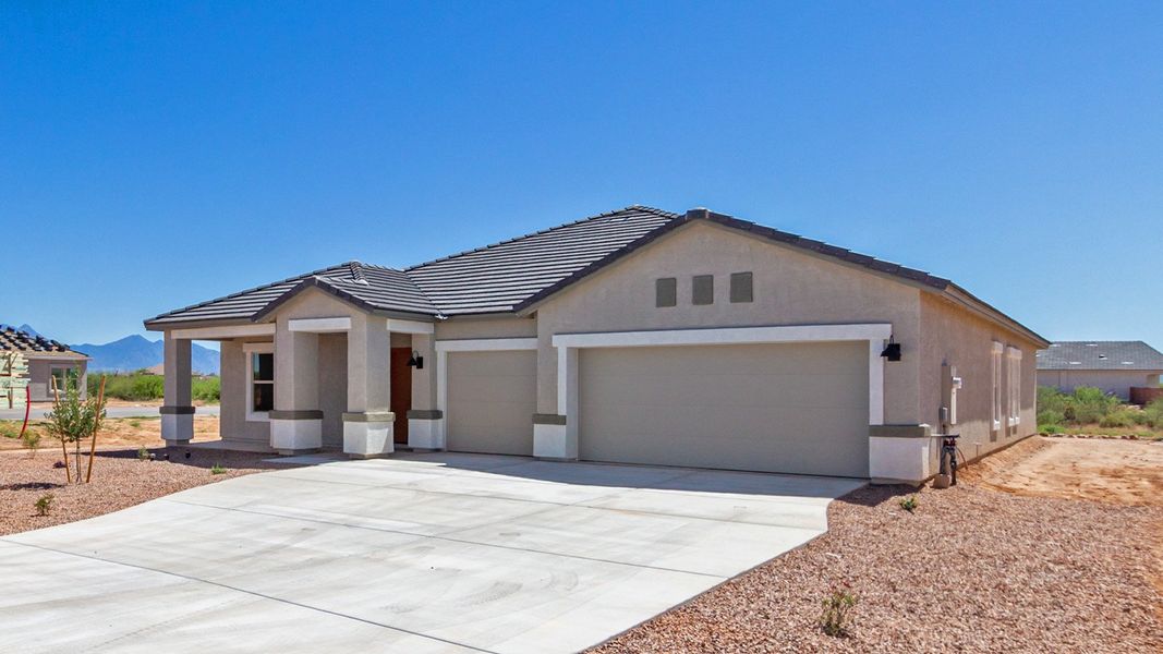 Representative exterior photo of a completed home built from the Sedona - Plan H50T7 by D.R. Horton in Sahuarita Acres, Sahuarita, AZ (Image 2).