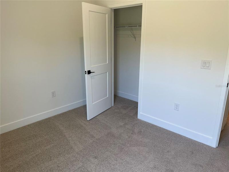 Spacious, unfurnished interior of a new home in Harmony Central, St. Cloud (Image 17).