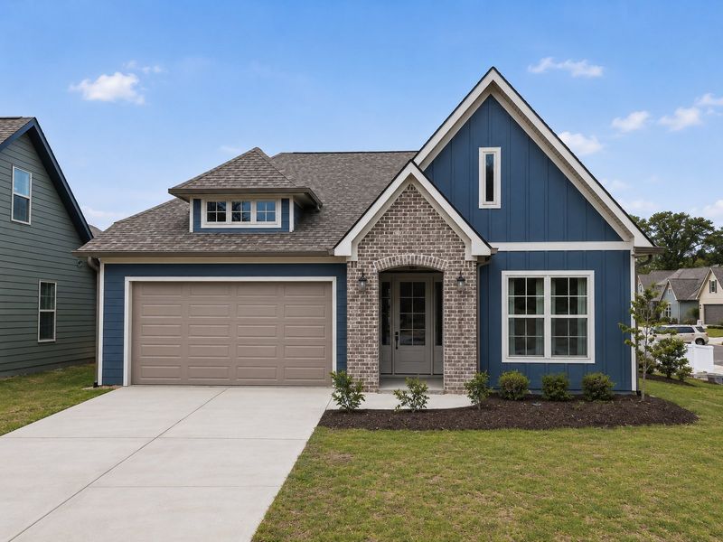 Front exterior of a new home in Storyvale, Hixson, TN, highlighting curb appeal (Image 2).