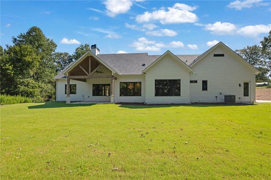 Exterior details and patio area of a home in , Ellijay (Image 4).