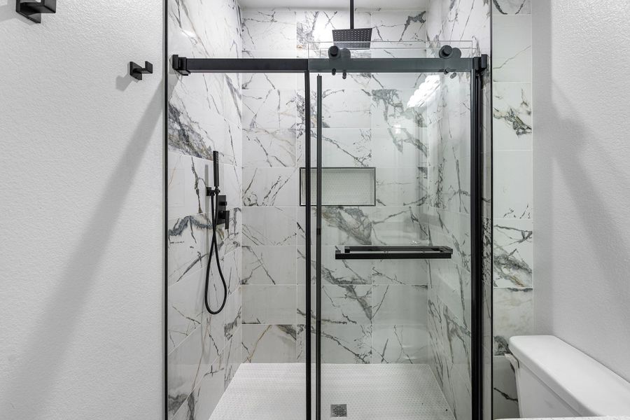 This shower offers multiple shower head extensions that are provided. You will definitely enjoy taking showers in this home.