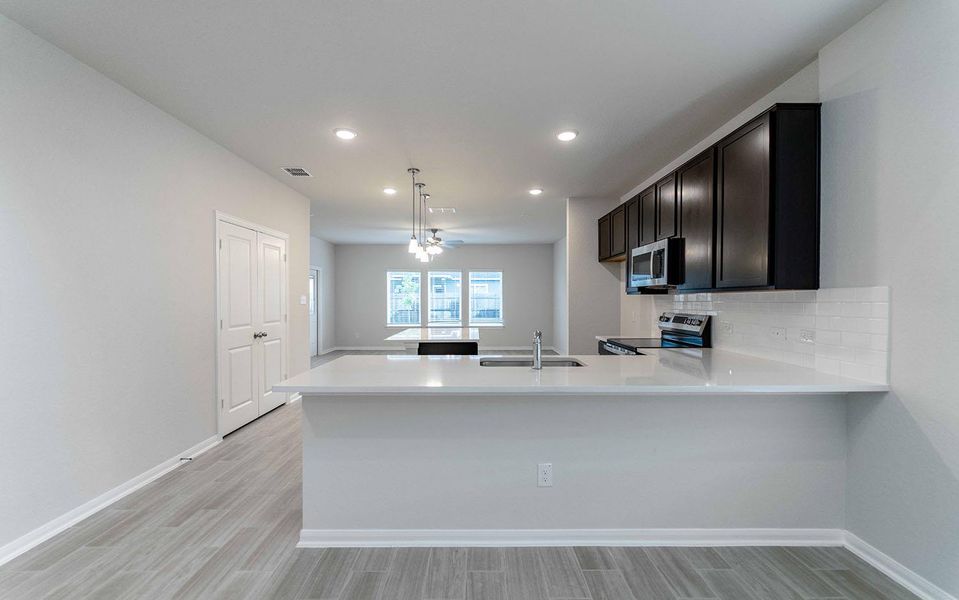 Furnished interior view inside a new home in Swenson Heights, Seguin (Image 4).