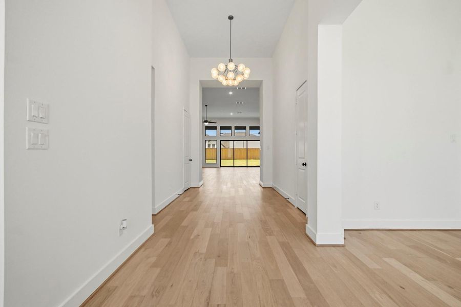 Spacious, unfurnished interior of a new home in Dunham Pointe 70', Cypress (Image 13).