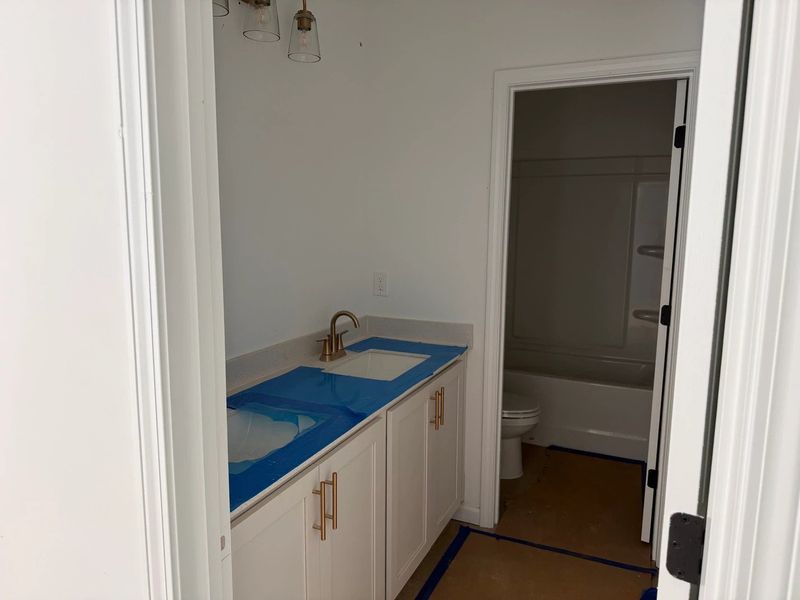 Bath 2 featuring the AW Collection® Serene - Earth-toned surfaces bring warmth and calm.