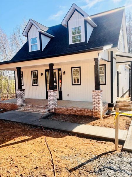 Exterior details and patio area of a home in , Oakboro (Image 2). Exterior details and patio area of a home in , Oakboro (Image 2).
