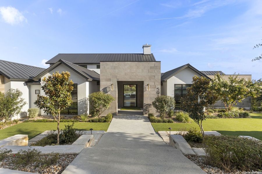 Front exterior of a new home in , San Antonio, TX, highlighting curb appeal (Image 26). Front exterior of a new home in , San Antonio, TX, highlighting curb appeal (Image 26).