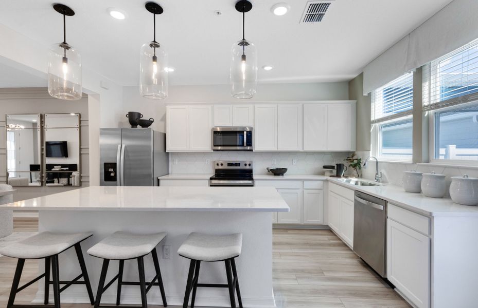 Representative furnished interior of a home built from the Foxtail - Interior Unit by Pulte Homes in Silverleaf Oaks, Winter Garden (Image 14).