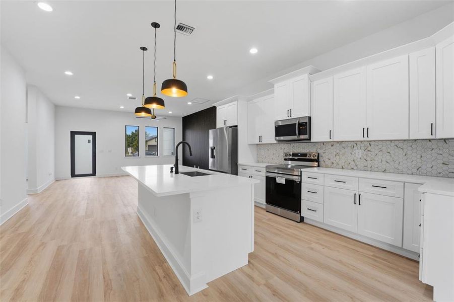 Furnished interior view inside a new home in , Port Charlotte (Image 6).