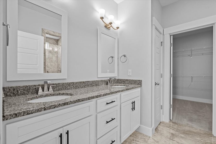 Representative furnished interior of a home built from the Hartford Elite by Enchanted Homes in Pointe Summit, Slater-Marietta (Image 6).