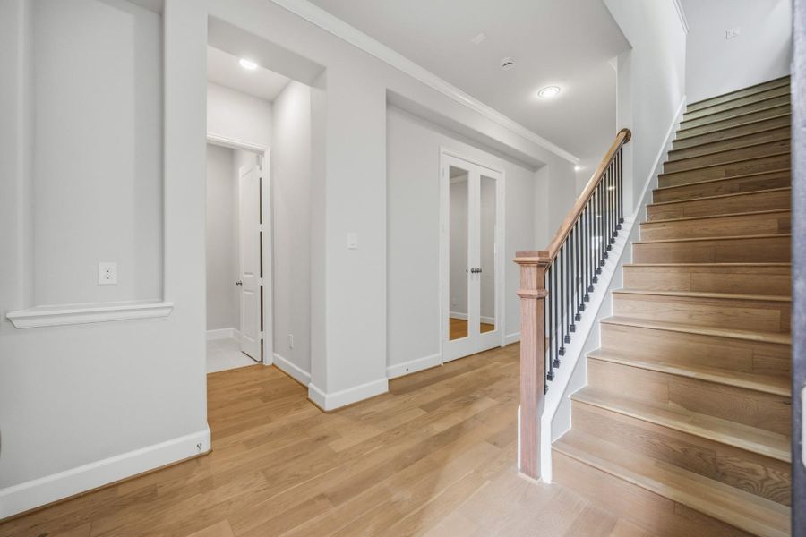 The Bordeaux welcomes you with tall ceilings, elegant crown molding, and wide-plank flooring that flows throughout the first floor. The Bordeaux welcomes you with tall ceilings, elegant crown molding, and wide-plank flooring that flows throughout the first floor.