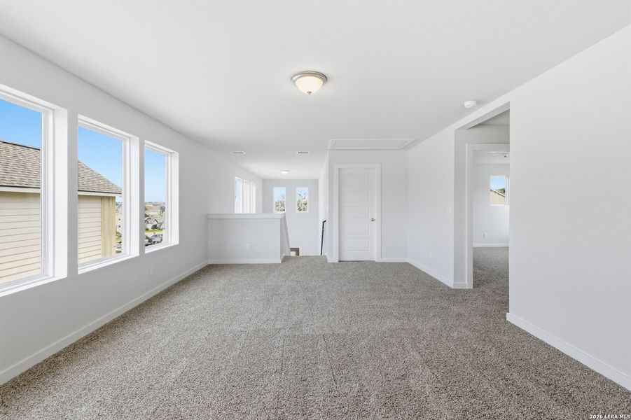 Spacious, unfurnished interior of a new home in The Meadows at Hunters Ranch, San Antonio (Image 7).