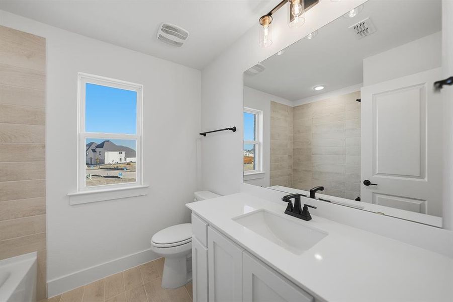 Furnished interior view inside a new home in Brookhollow West, Prosper (Image 8).