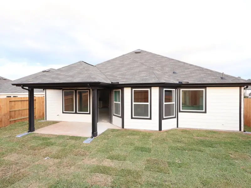Exterior details and patio area of a home in Magnolia Ridge, Magnolia (Image 3). Exterior details and patio area of a home in Magnolia Ridge, Magnolia (Image 3).