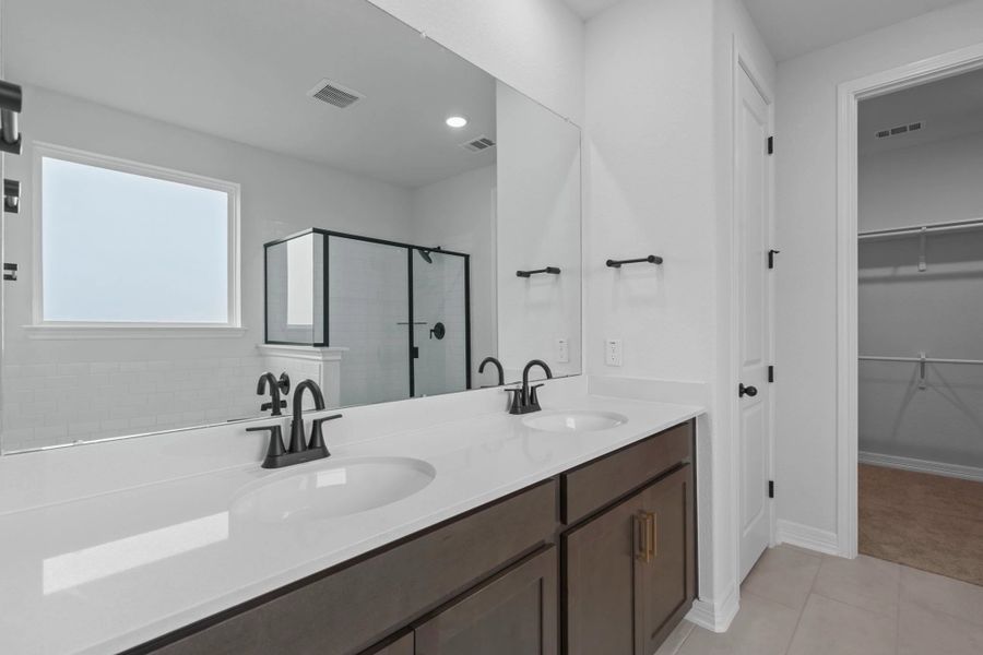 Primary bathroom. Sample product photo. Actual exterior and interior selections may vary by homesite. Photo may be virtually staged. Primary bathroom. Sample product photo. Actual exterior and interior selections may vary by homesite. Photo may be virtually staged.