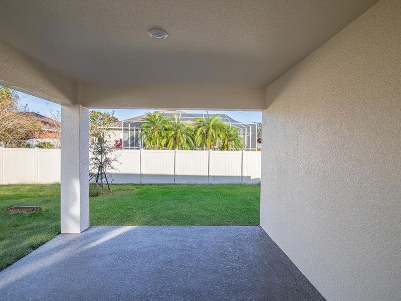 Your living space extends outdoors to a covered lanai - Ashlyn by Highland Homes