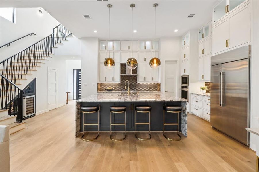 Gorgeous wide plank hardwoods and 12' ceilings add to the wonderful first floor features.