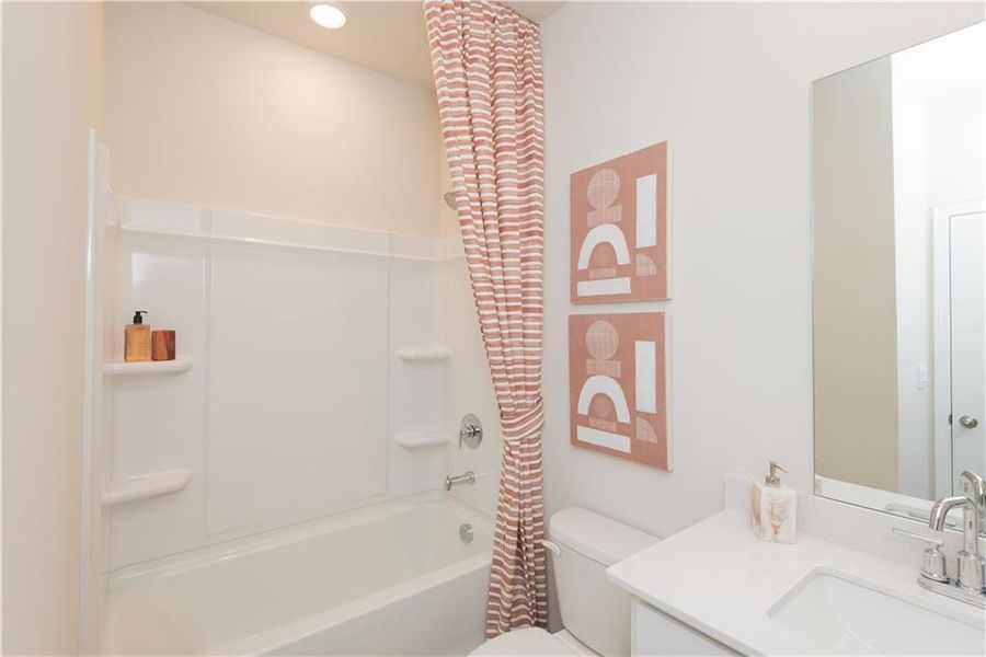 Furnished interior view inside a new home in Martin Springs - Estate Series, Lawrenceville (Image 14).