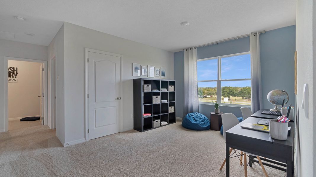 Furnished interior view inside a new home in Harmony at Lake Eloise, Winter Haven (Image 17).