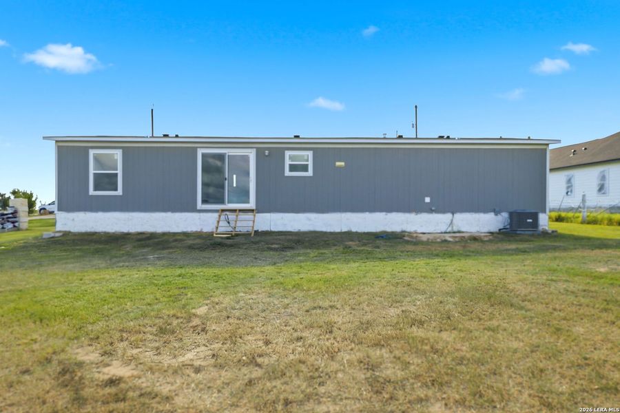 Exterior details and patio area of a home in , Atascosa (Image 24).