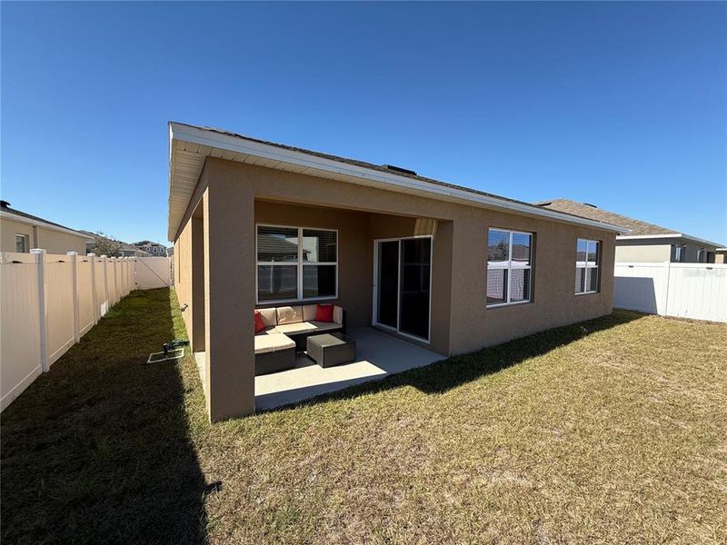 Exterior details and patio area of a home in Cypress Park Estates, Haines City (Image 31).