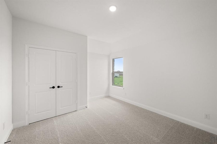 Spacious, unfurnished interior of a new home in Coyote Crossing, Godley (Image 17).