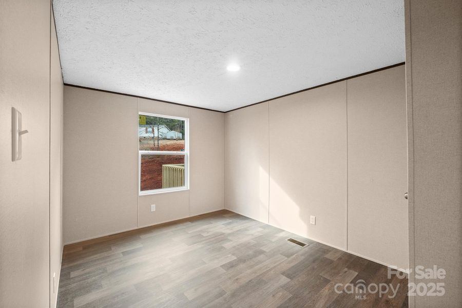 Spacious, unfurnished interior of a new home in , Lenoir (Image 18).