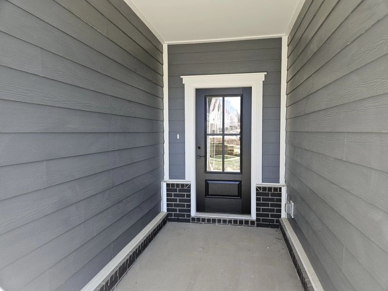 Exterior details and patio area of a home in Cedars of Cane Ridge | 55+ Community, Antioch (Image 3). Exterior details and patio area of a home in Cedars of Cane Ridge | 55+ Community, Antioch (Image 3).