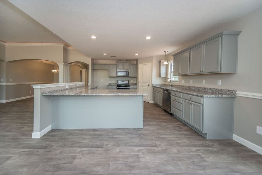 Representative furnished interior of a home built from the Beaumont by Enchanted Homes in Guadalupe Heights, Seguin (Image 16).