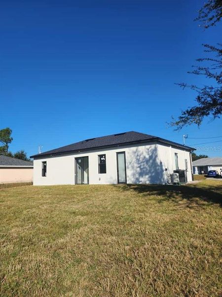 Exterior details and patio area of a home in , Lehigh Acres (Image 3).