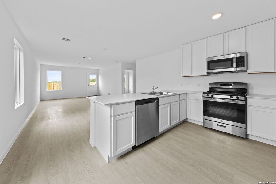Furnished interior view inside a new home in Spring Grove, St. Hedwig (Image 8).