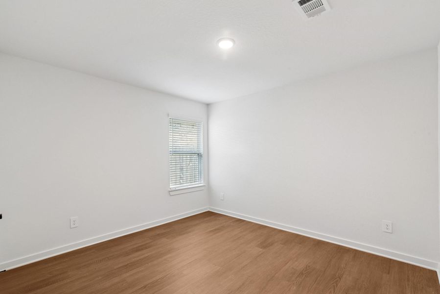 Spacious, unfurnished interior of a new home in Pinewood at Grand Texas, New Caney (Image 10).