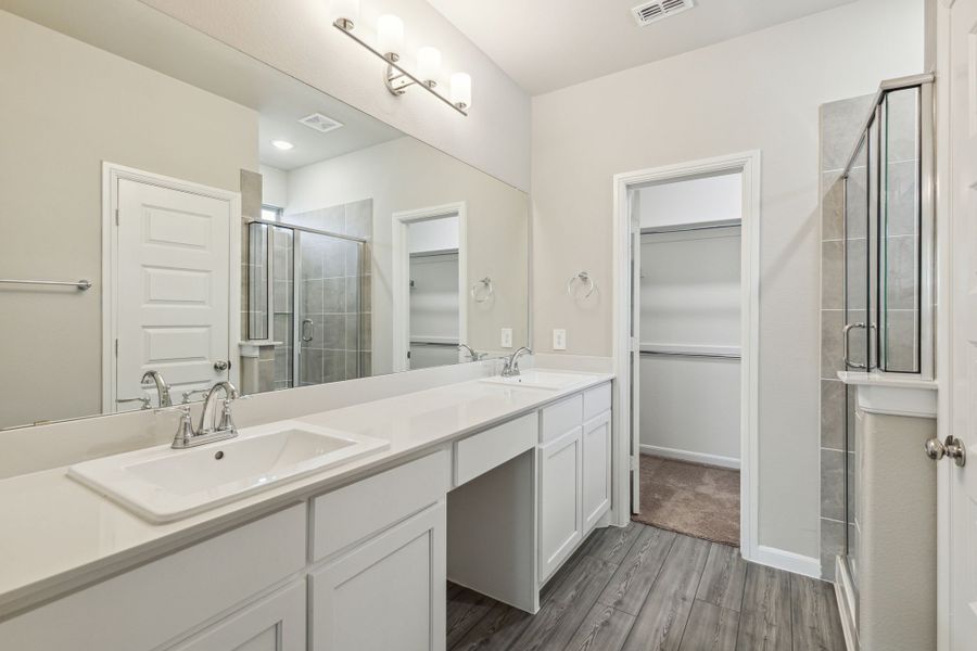 Primary Bathroom in the Pearl home plan by Trophy Signature Homes – REPRESENTATIVE PHOTO