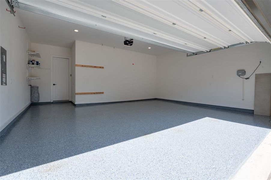 Newly epoxied garage floor.  Garage is over-sized, perfect for all your toys!