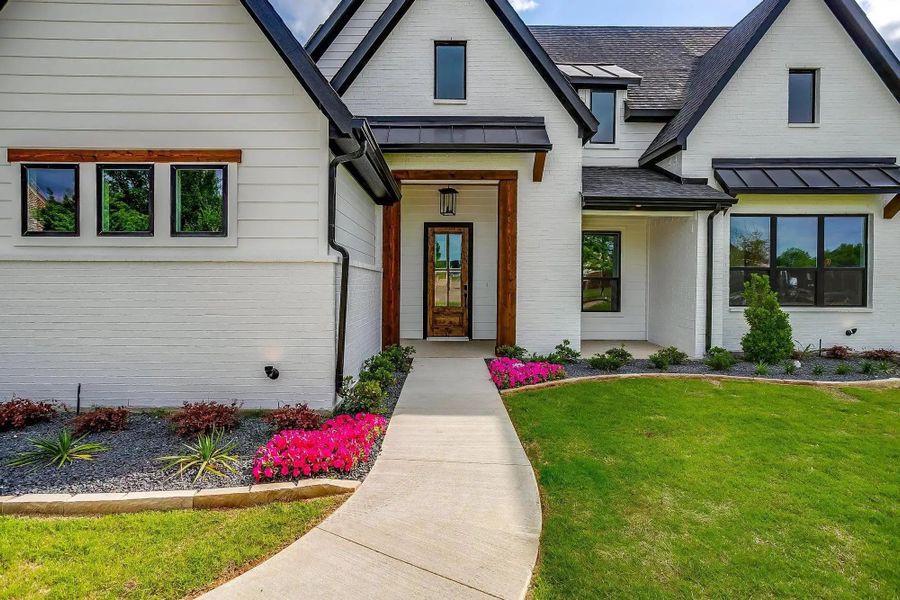 Representative exterior details of a home built from the The Blaire by Elmwood Custom Homes in Hidden Lakes on Mockingbird, Midlothian (Image 11). Representative exterior details of a home built from the The Blaire by Elmwood Custom Homes in Hidden Lakes on Mockingbird, Midlothian (Image 11).