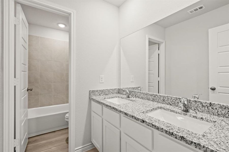 Furnished interior view inside a new home in Retreat at Fossil Creek, Fort Worth (Image 9). Furnished interior view inside a new home in Retreat at Fossil Creek, Fort Worth (Image 9).