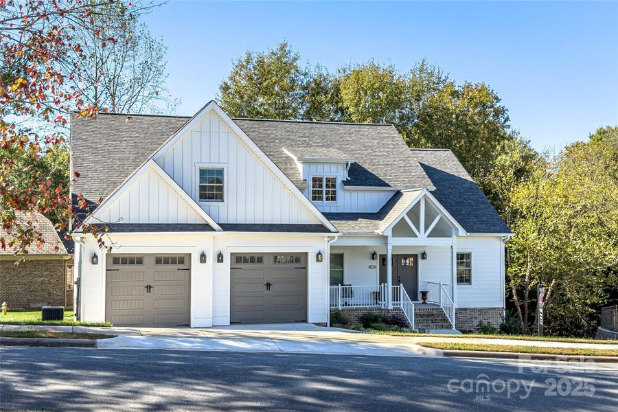 Front exterior of a new home in , Hickory, NC, highlighting curb appeal (Image 1).
