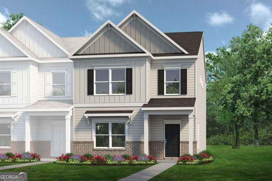 Front exterior of a new home in Crescent Towns, Riverdale, GA, highlighting curb appeal (Image 1). Front exterior of a new home in Crescent Towns, Riverdale, GA, highlighting curb appeal (Image 1).