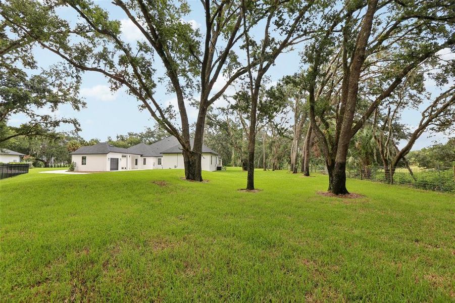 Front exterior of a new home in , Lutz, FL, highlighting curb appeal (Image 26).