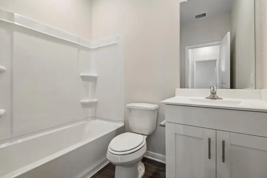 Furnished interior view inside a new home in Sweetwater Ridge, Conroe (Image 6).