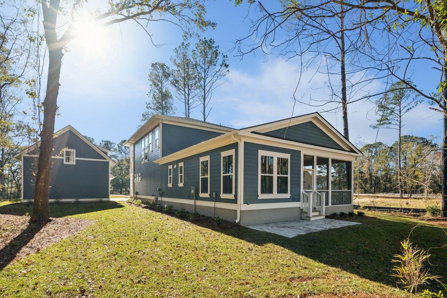 Exterior details and patio area of a home in , Awendaw (Image 35).