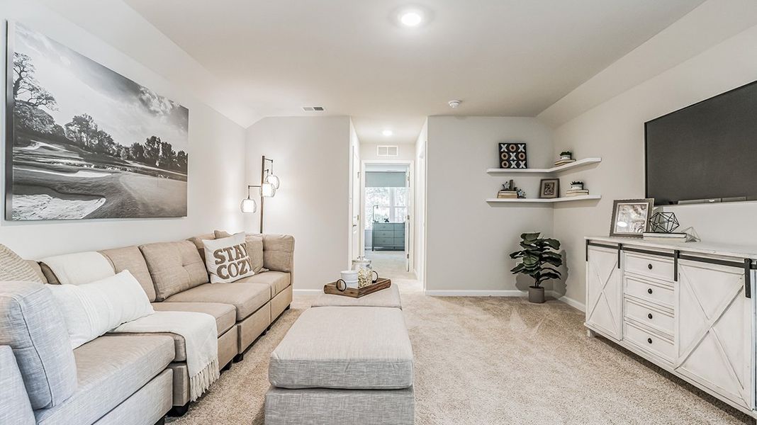 Representative furnished interior of a home built from the Bristol Bonus by D.R. Horton in Riverwood Gardens, Oakland (Image 14).