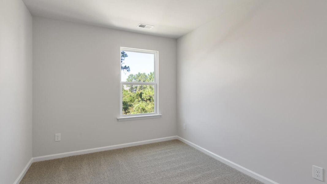 Spacious, unfurnished interior of a new home in The Landing at Sidbury Station, Castle Hayne (Image 29).
