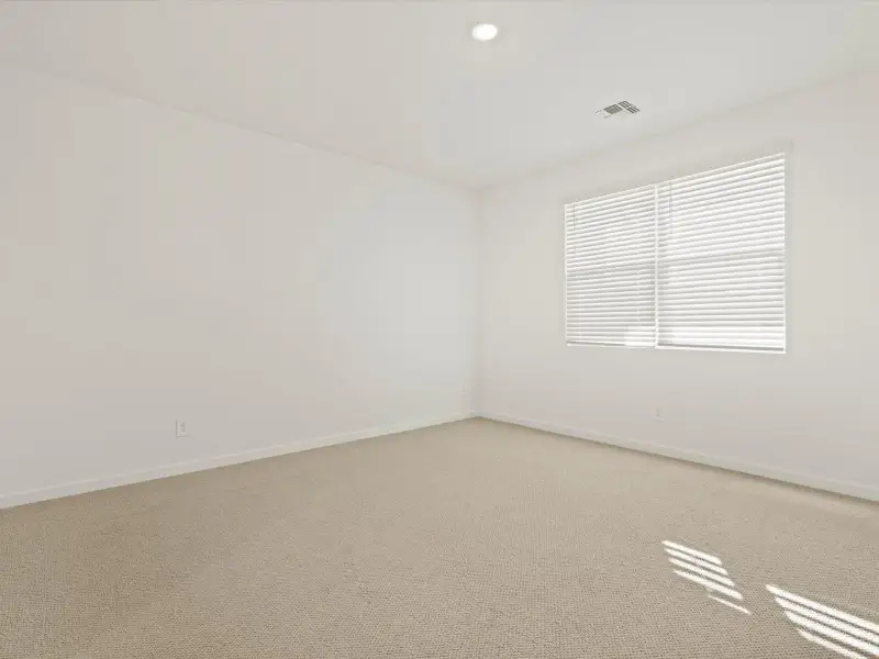 Spacious, unfurnished interior of a new home in Entrada Reserve Series, Tolleson (Image 8).