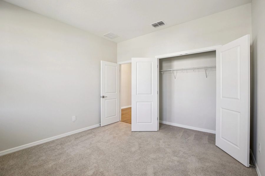 Spacious bedroom 3 with a two door closet