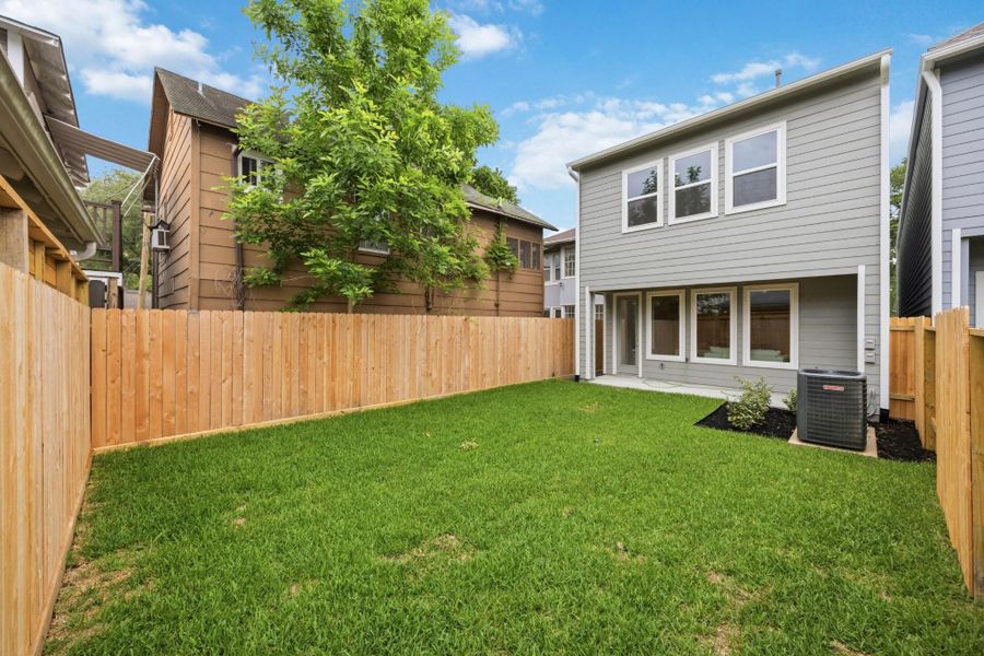 Step outside to your wide, covered porch, overlooking a generously sized, fully sodded yard, enclosed by a cedar privacy fence for moments of peaceful solitude. Step outside to your wide, covered porch, overlooking a generously sized, fully sodded yard, enclosed by a cedar privacy fence for moments of peaceful solitude.