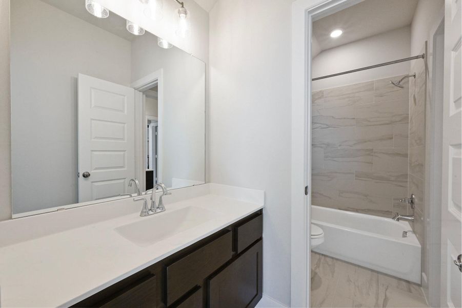 Furnished interior view inside a new home in Santa Rita Ranch, Liberty Hill (Image 9).